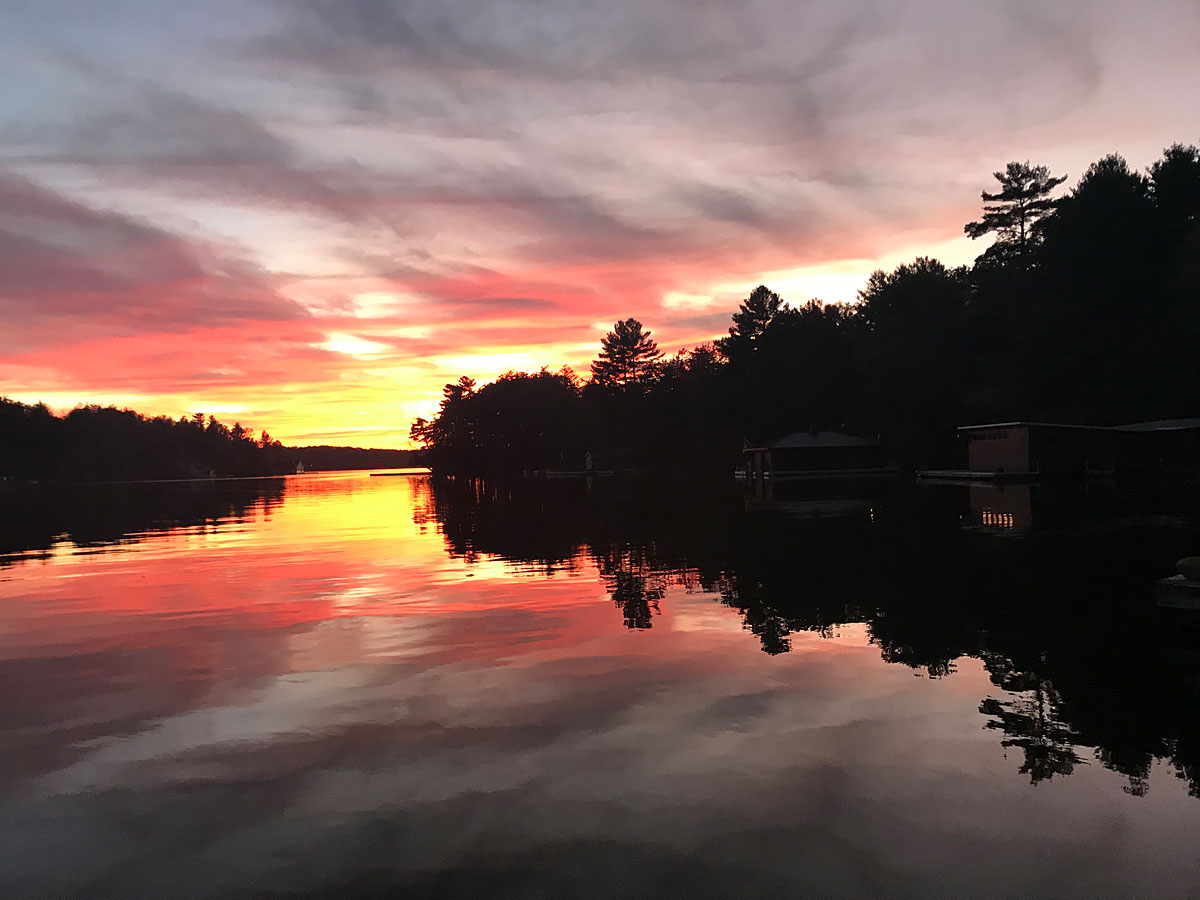 sunset over a calm lake